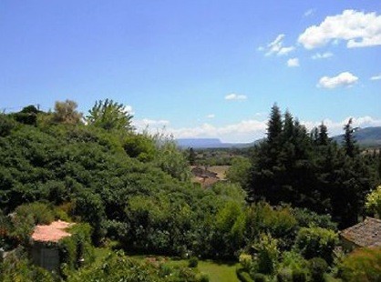 A village house of 150m2 divided into 2 properties with landscaped garden o