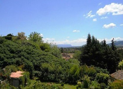 A village house of 150m2 divided into 2 properties with landscaped garden o