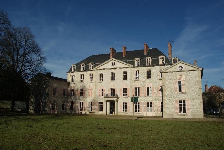 18th Century chateau located in Burgundy, at the edge of a village in a cha