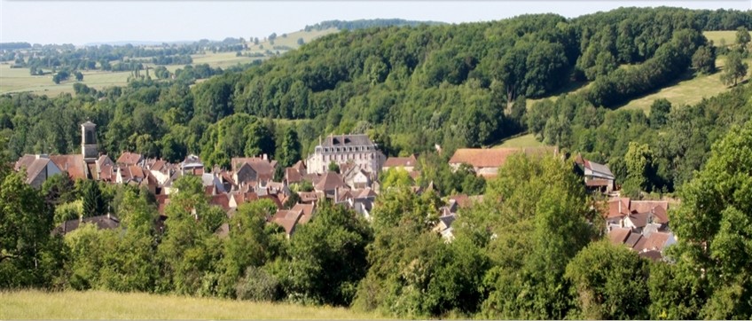 18th Century chateau located in Burgundy, at the edge of a village in a cha
