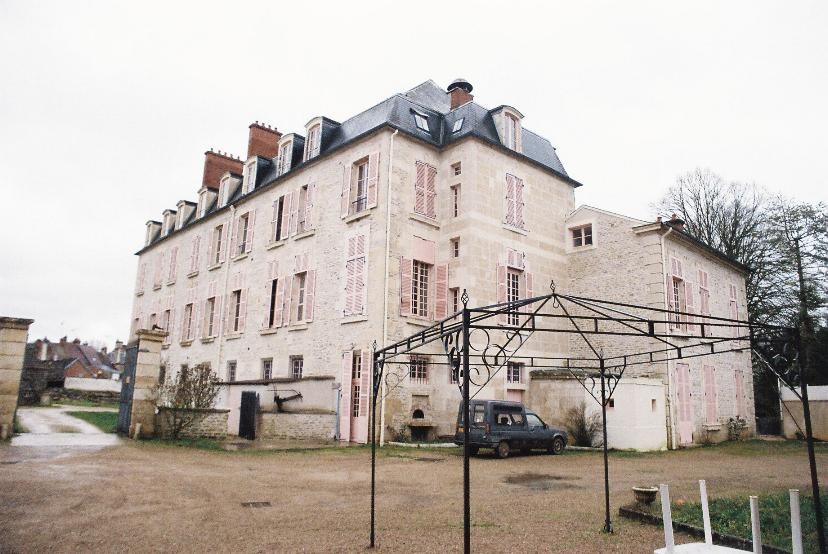 18th Century chateau located in Burgundy, at the edge of a village in a cha