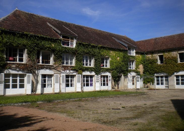 18th Century chateau located in Burgundy, at the edge of a village in a cha