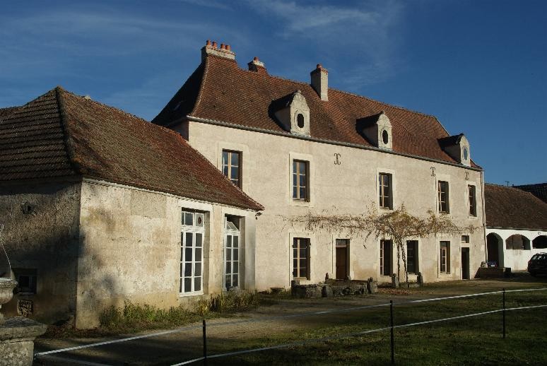 18th Century chateau located in Burgundy, at the edge of a village in a cha