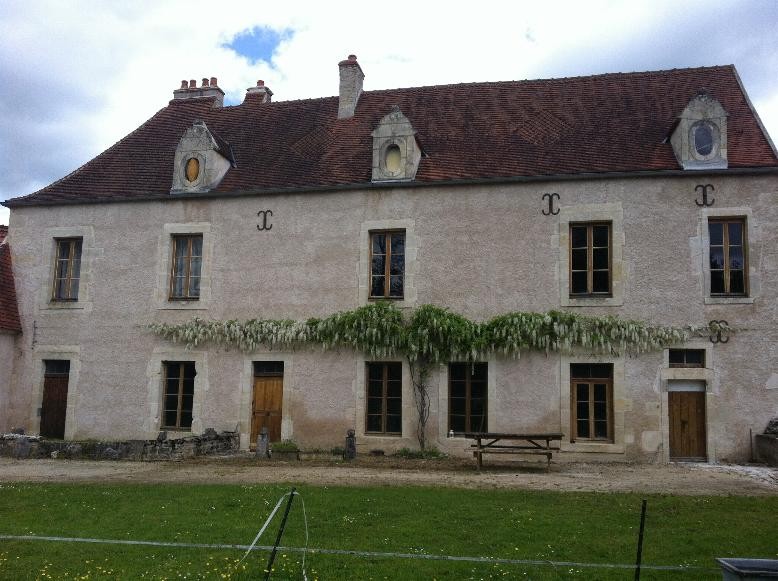 18th Century chateau located in Burgundy, at the edge of a village in a cha