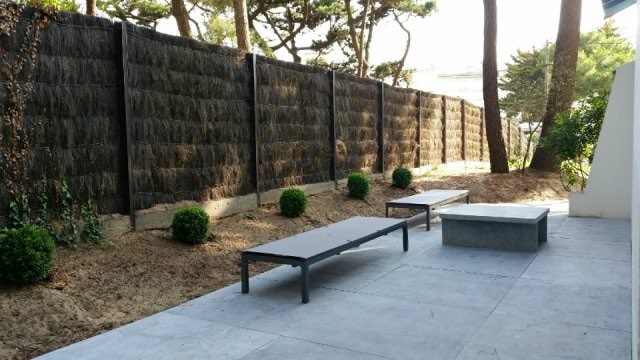 A delightful luxury seaside home set in 708m2 of private parkland garden, w