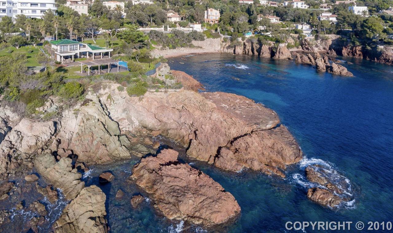 Luxurious 4 bedroom waterfront villa with a separate studio apartment, set