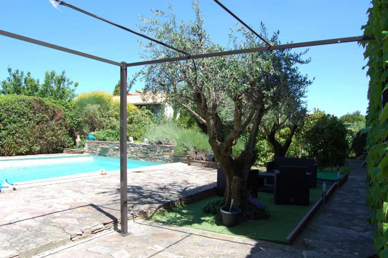 Pretty stone village property with a swimming pool and garden in the Minerv