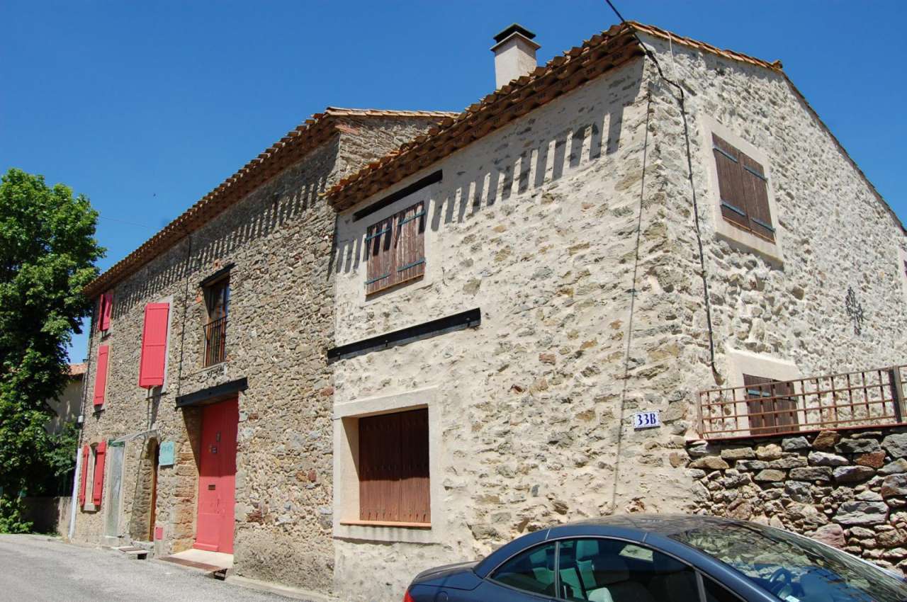 Pretty stone village property with a swimming pool and garden in the Minerv