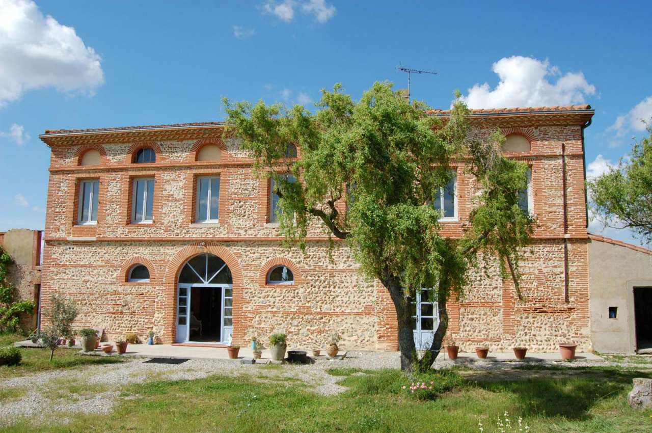 Charming stone built farmhouse located in Saverdun, set within a large coun