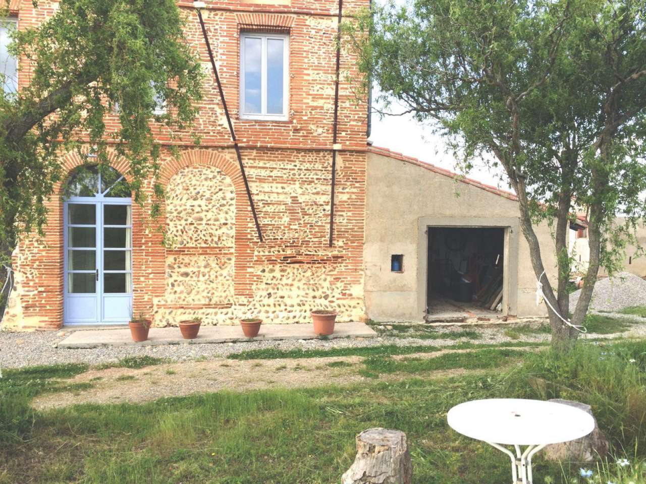 Charming stone built farmhouse located in Saverdun, set within a large coun