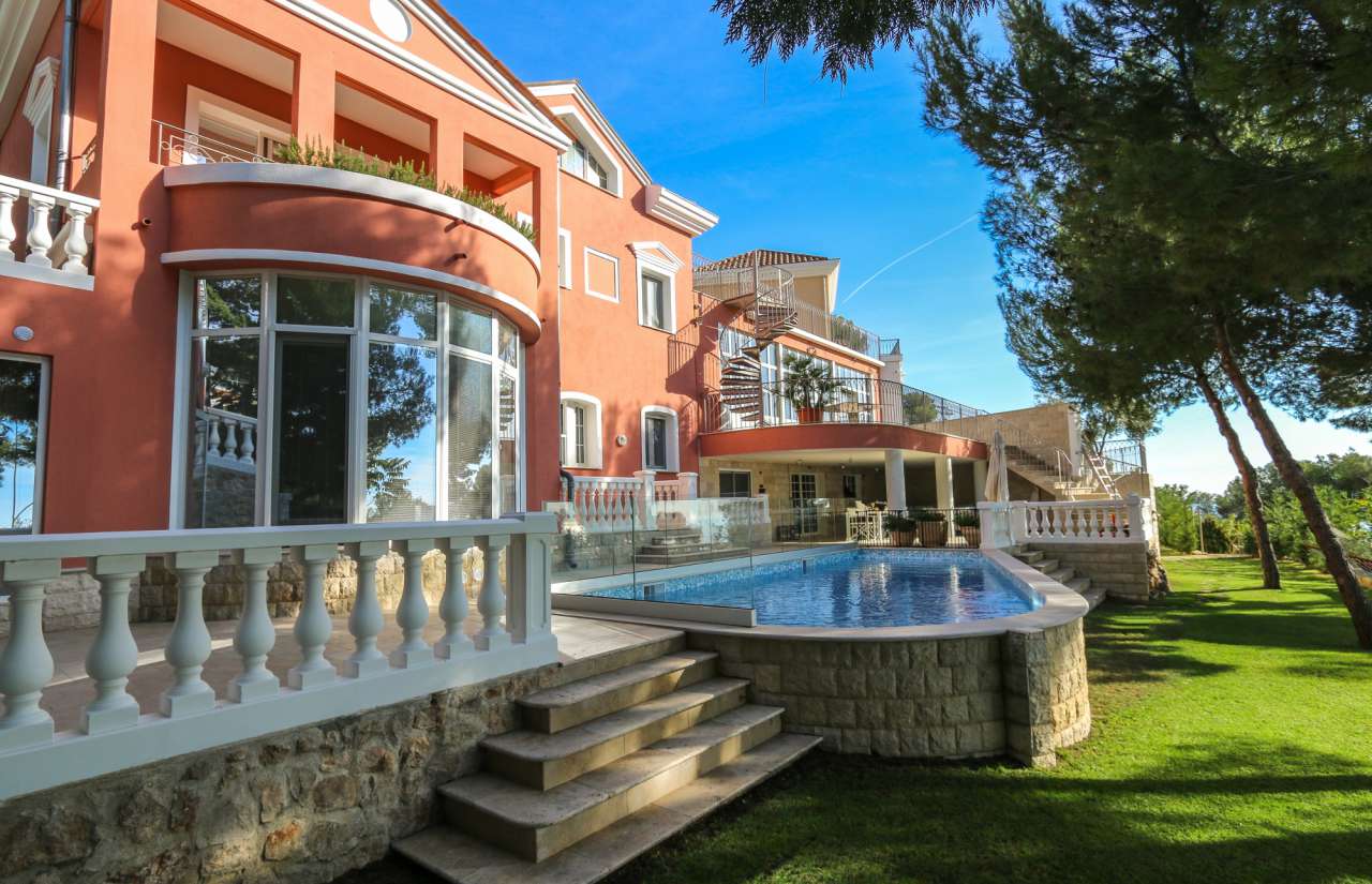 Impressive property for sale consisting of two new villas within a in a tra