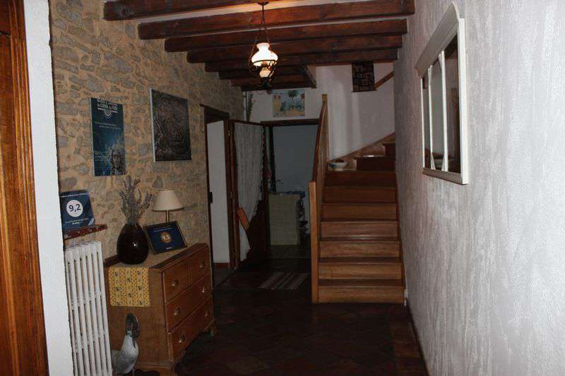 A charming and very nicely renovated character village property with 5 bedr