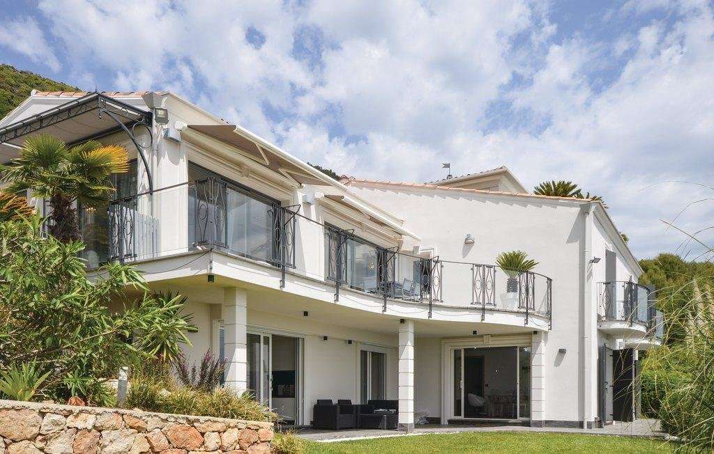 With panoramic sea and mountain views, this splendid 6 bedroom, architect d