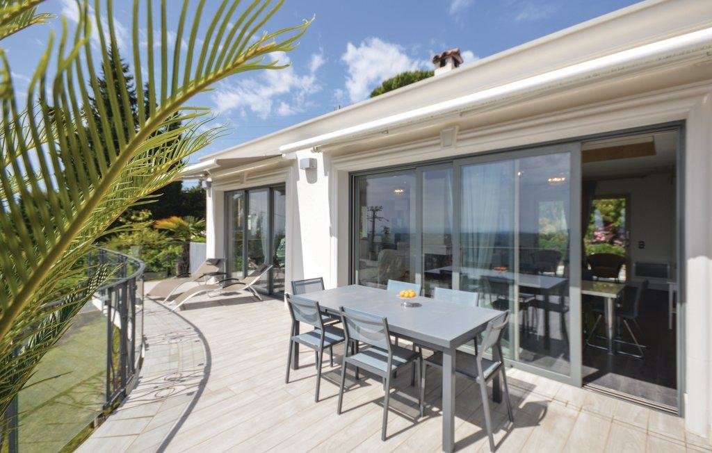 With panoramic sea and mountain views, this splendid 6 bedroom, architect d