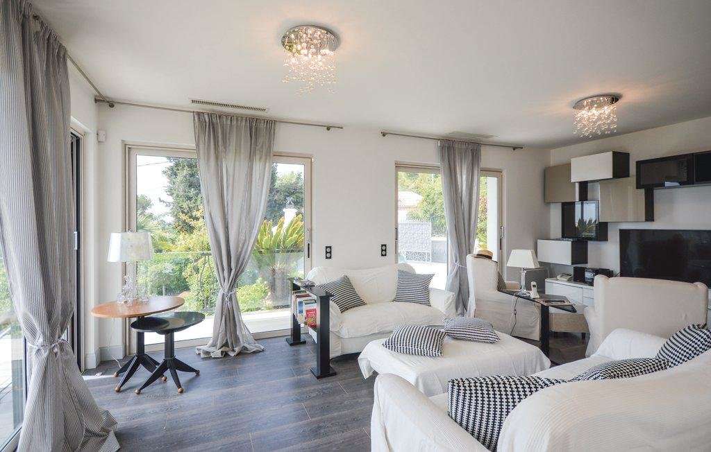 With panoramic sea and mountain views, this splendid 6 bedroom, architect d