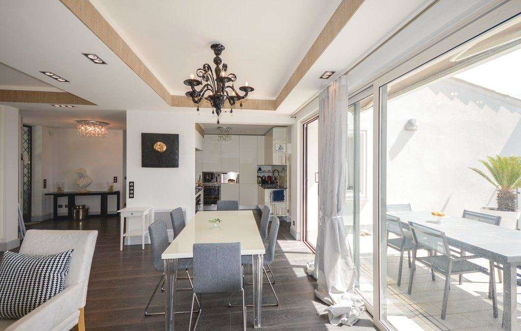 With panoramic sea and mountain views, this splendid 6 bedroom, architect d