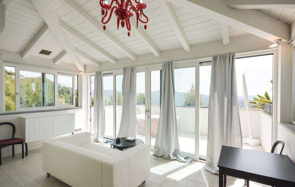 With panoramic sea and mountain views, this splendid 6 bedroom, architect d