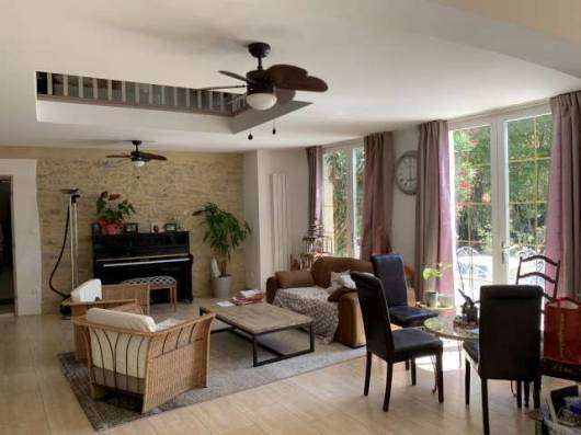 A tastefully renovated four bedroom farmhouse, complete with attached conve