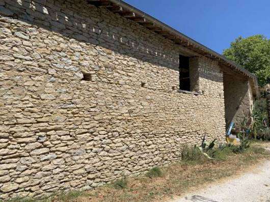 A tastefully renovated four bedroom farmhouse, complete with attached conve