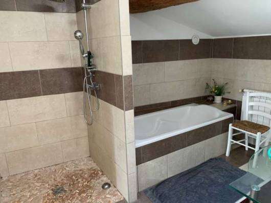 A tastefully renovated four bedroom farmhouse, complete with attached conve