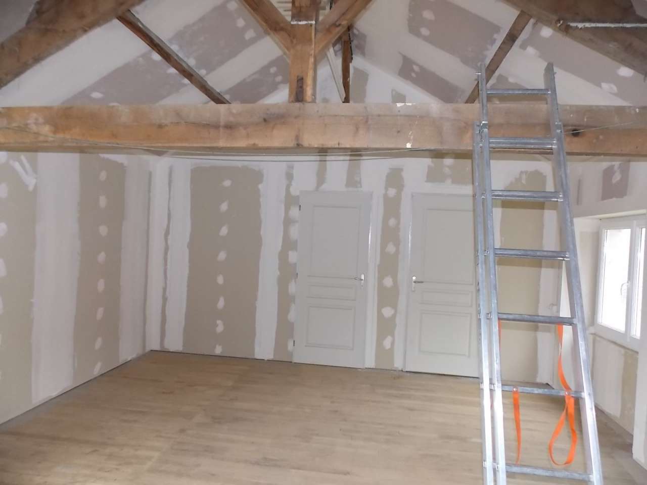 Spacious former water mill, with a river running alongside and with lovely