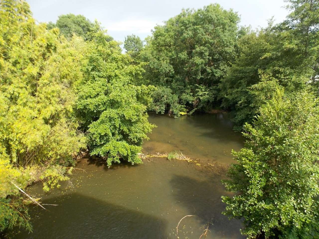 Spacious former water mill, with a river running alongside and with lovely