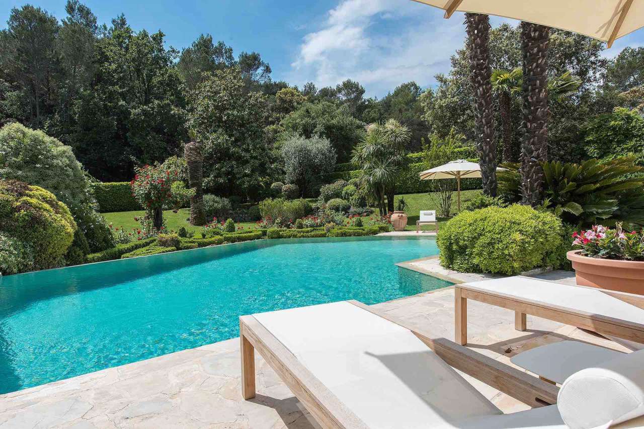 Surrounded by over half an acre of glorious gardens is this outstanding, be