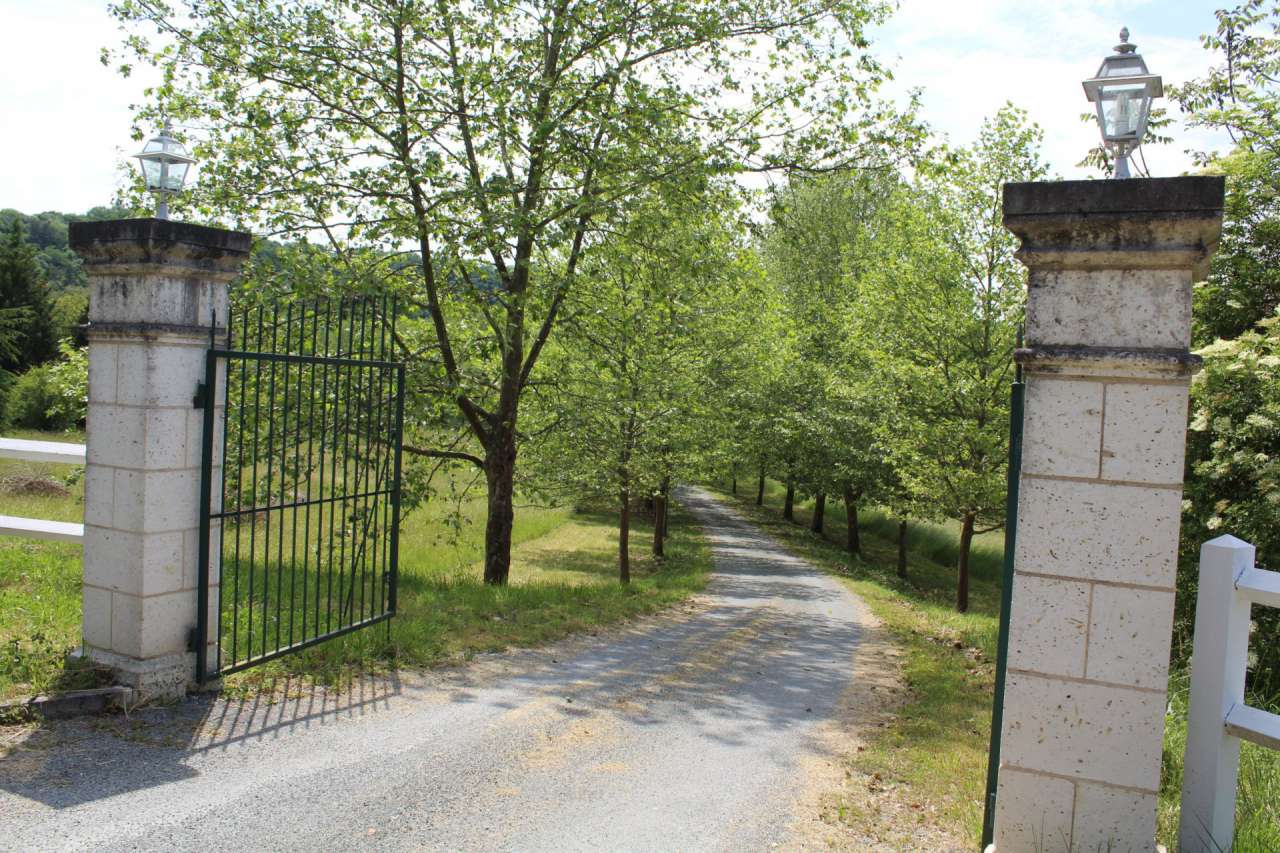 Beautiful 16th century water mill with various surrounding buildings and ex