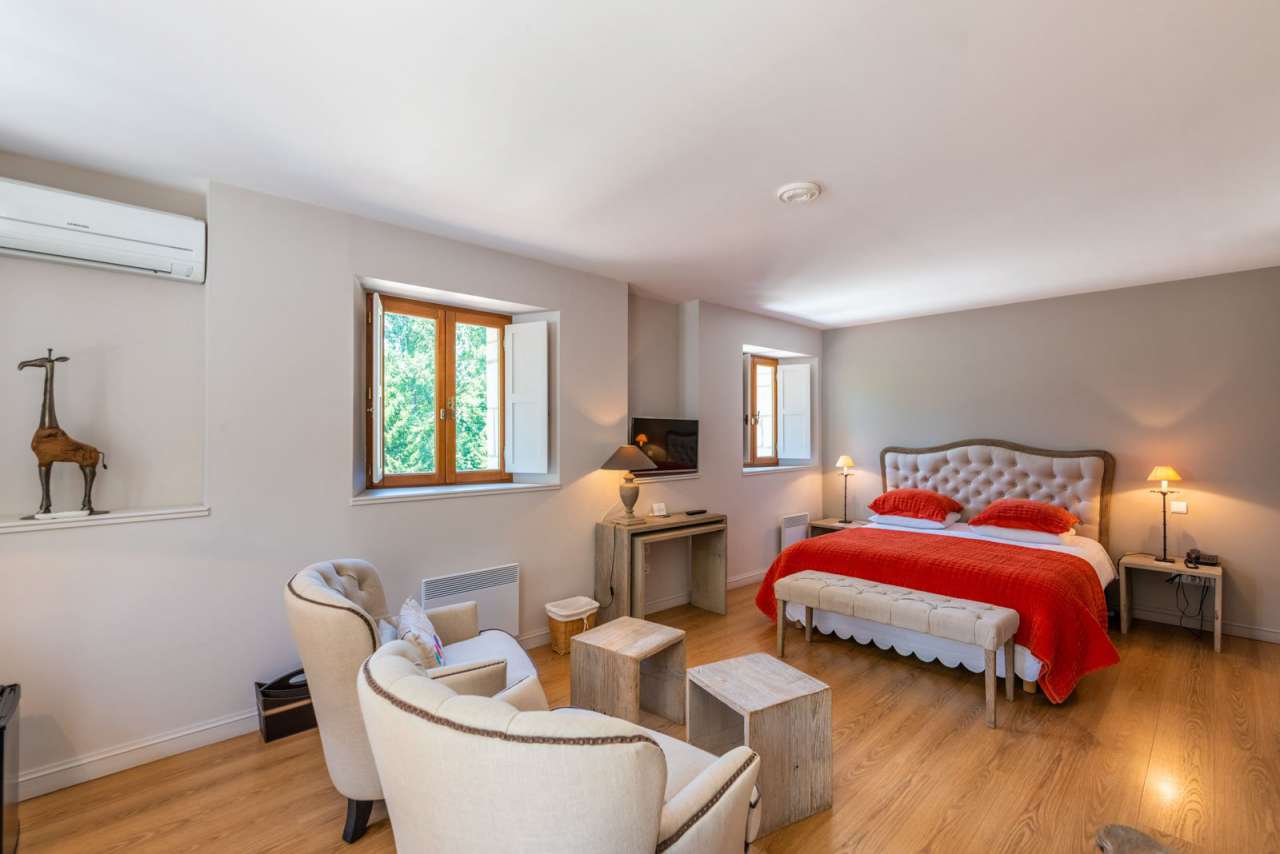 Beautiful 16th century water mill with various surrounding buildings and ex