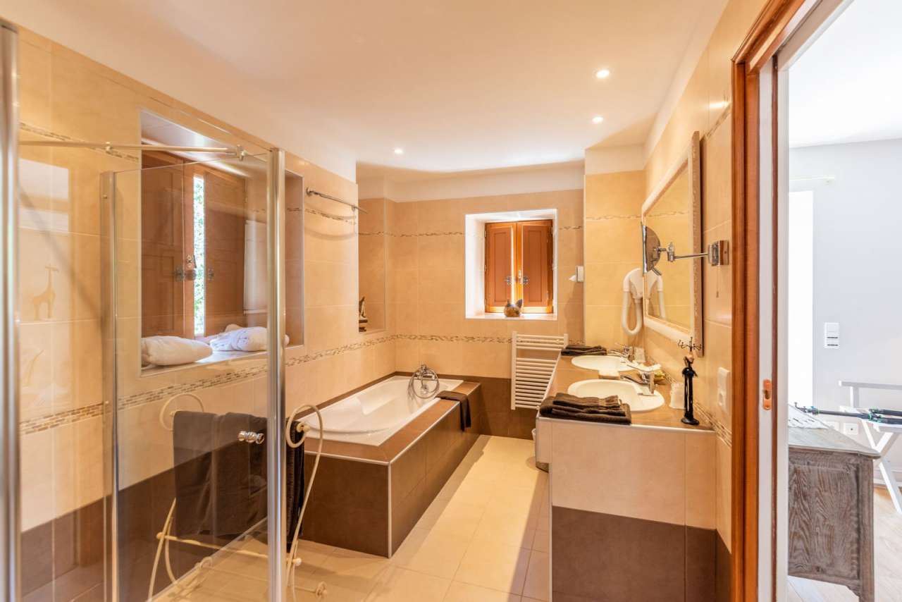 Beautiful 16th century water mill with various surrounding buildings and ex