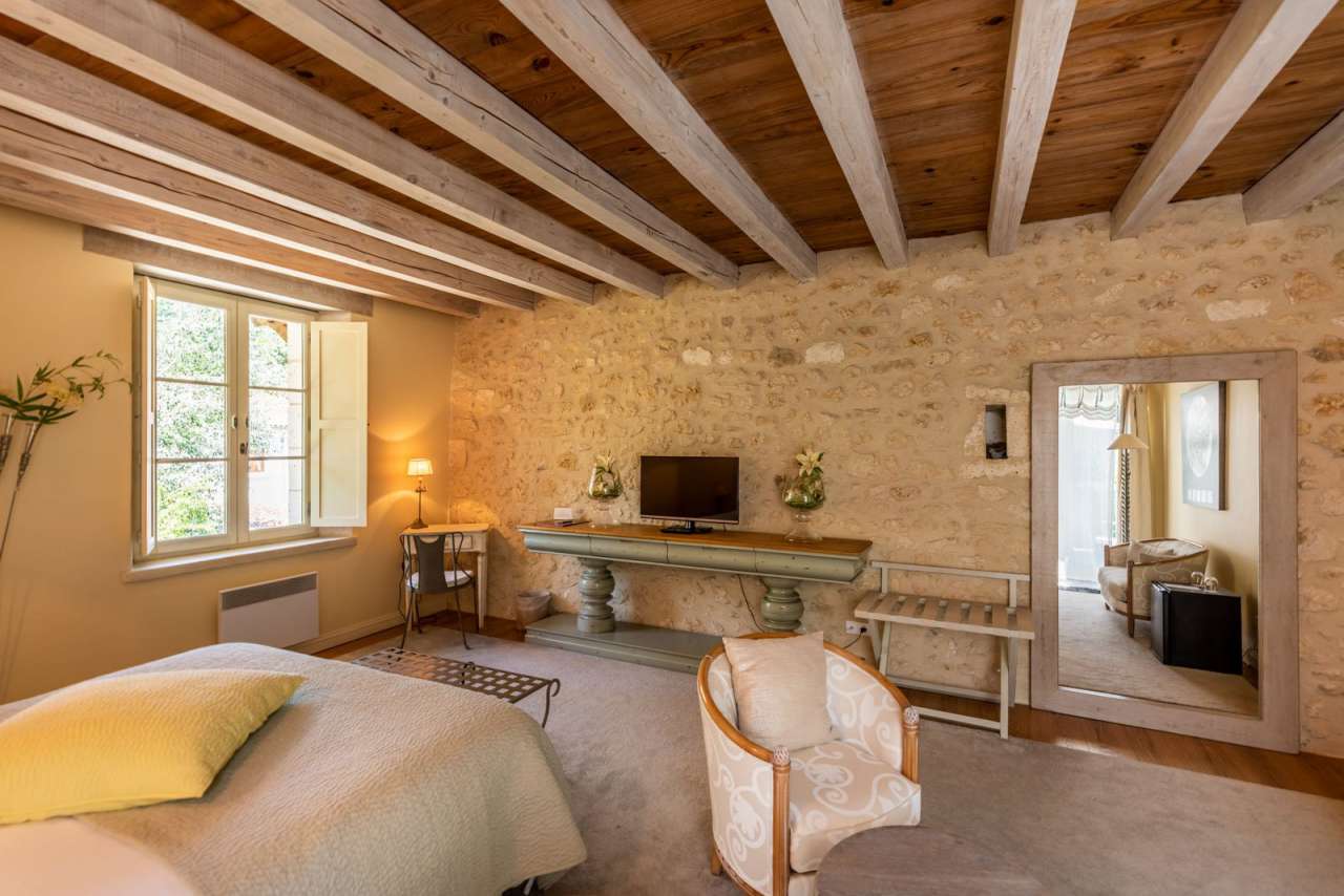 Beautiful 16th century water mill with various surrounding buildings and ex