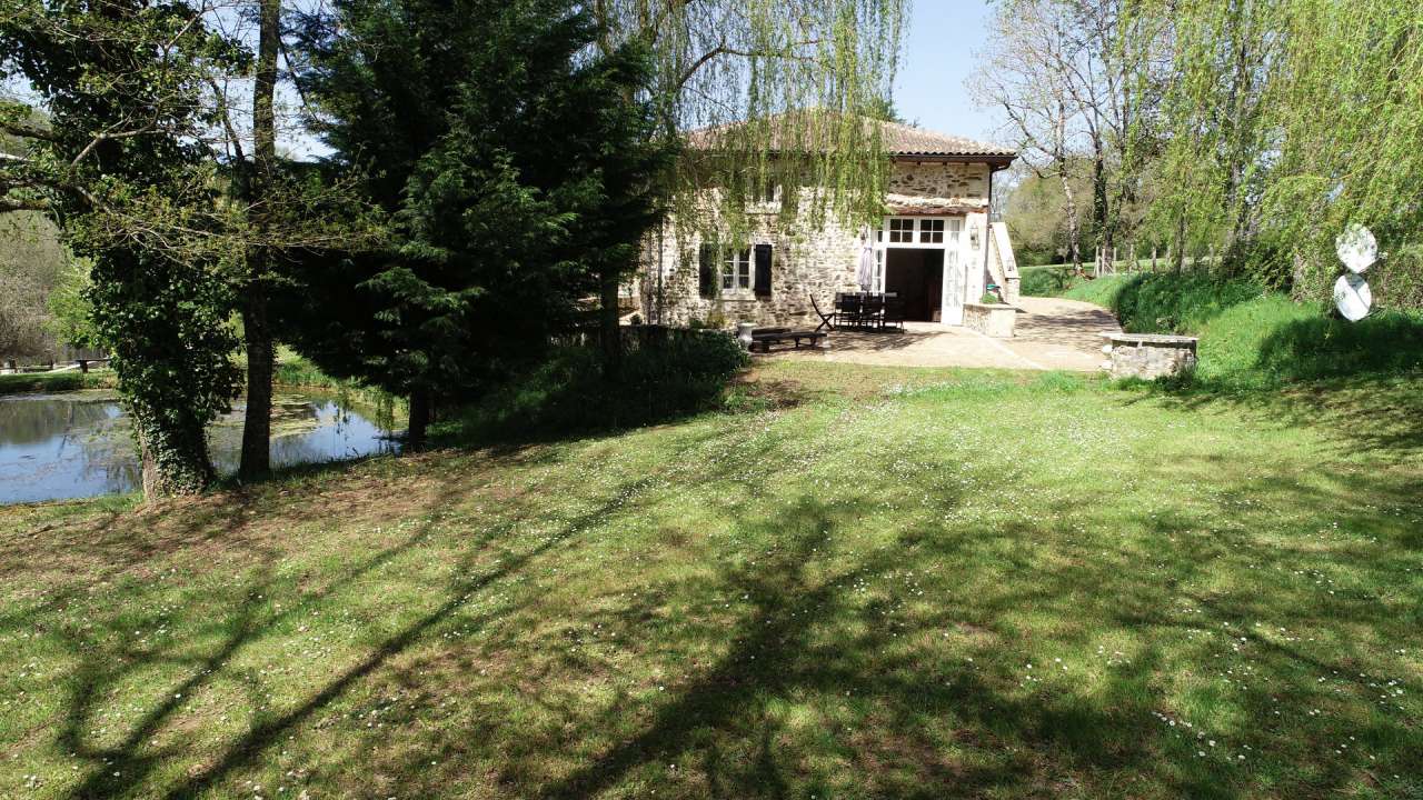 Nestling in nearly 3 acres of glorious land is this beautifully renovated c