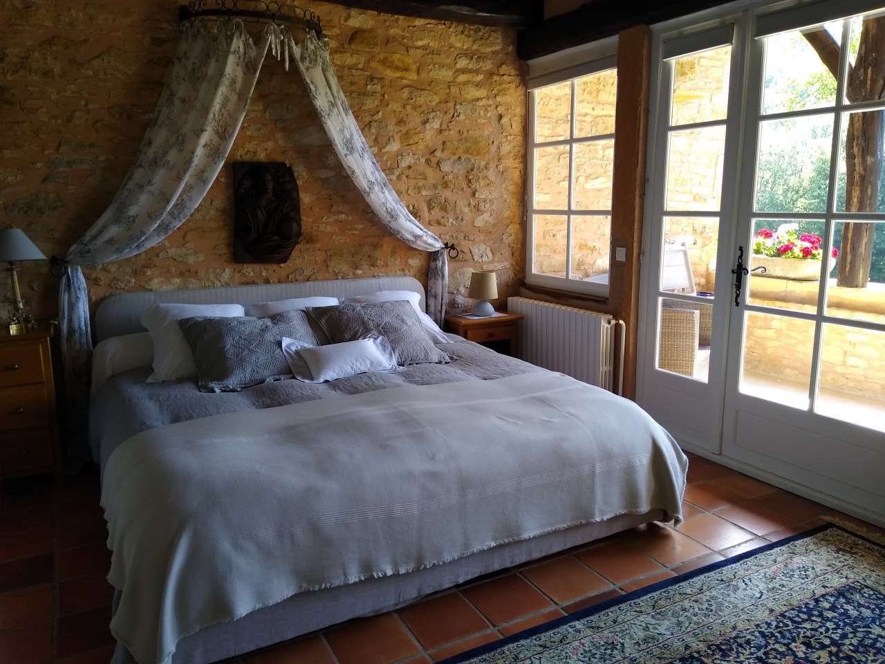 Nestling in nearly 10 acres of glorious landscaped gardens with trees and p