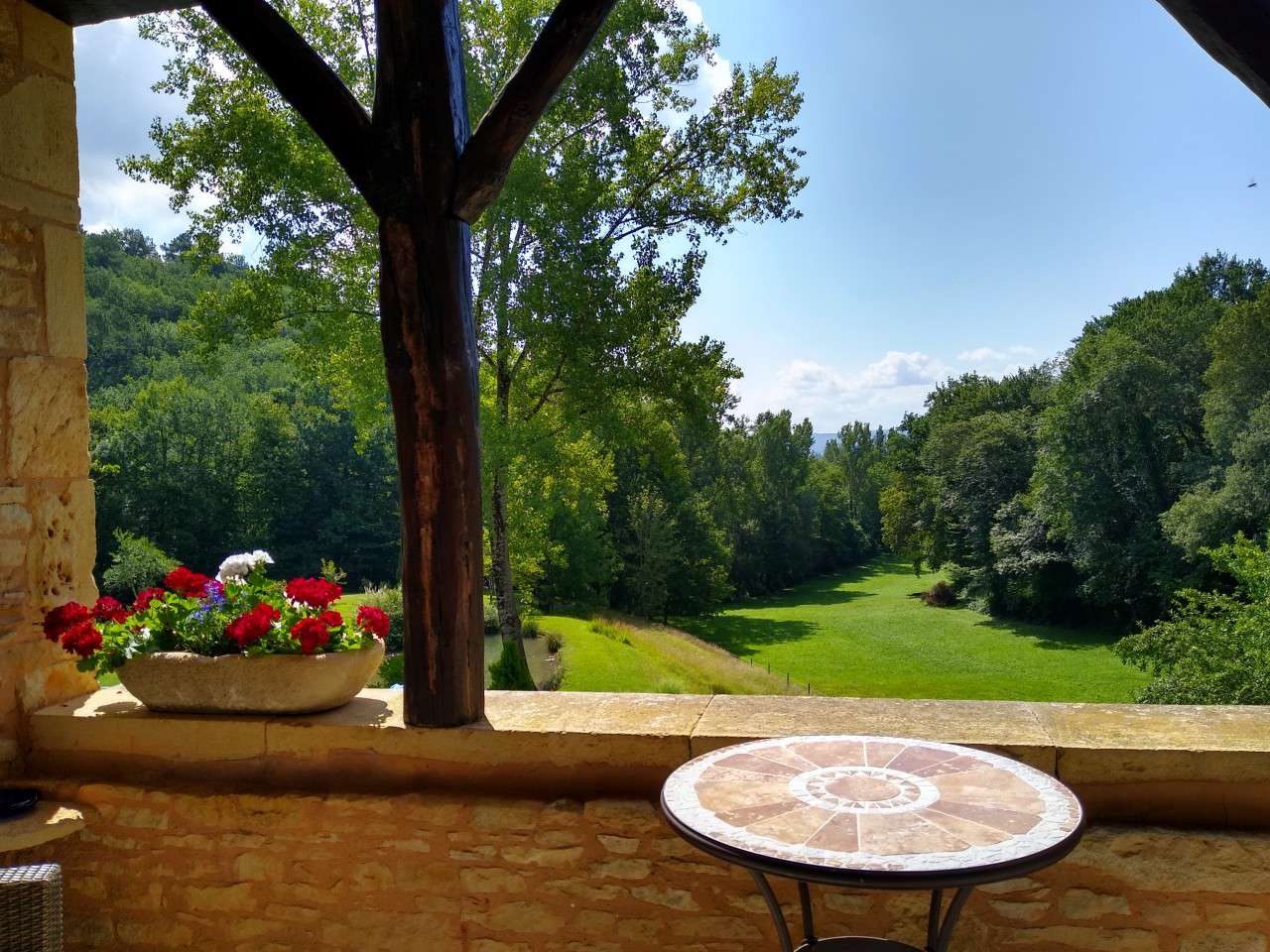 Nestling in nearly 10 acres of glorious landscaped gardens with trees and p