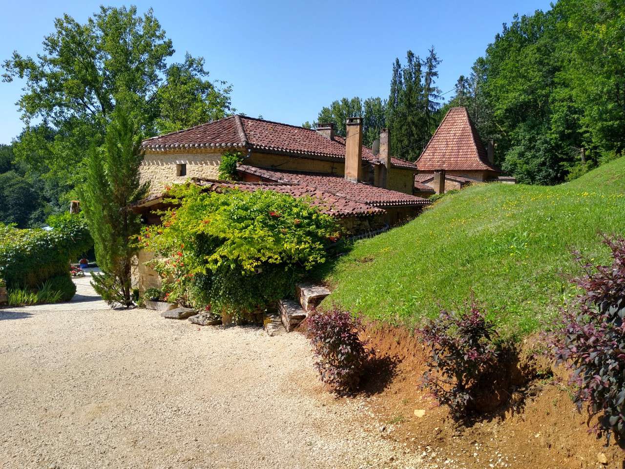 Nestling in nearly 10 acres of glorious landscaped gardens with trees and p