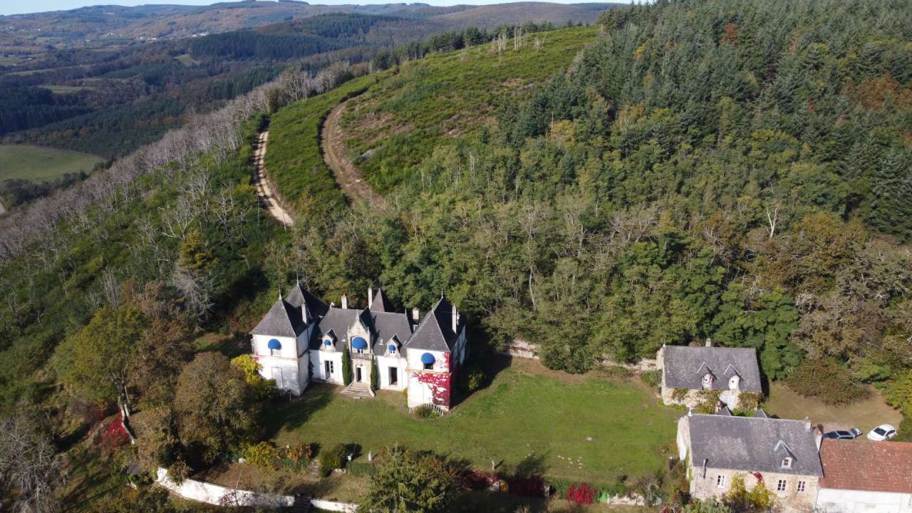 Charming character chateau in a beautiful and private wooded setting with o