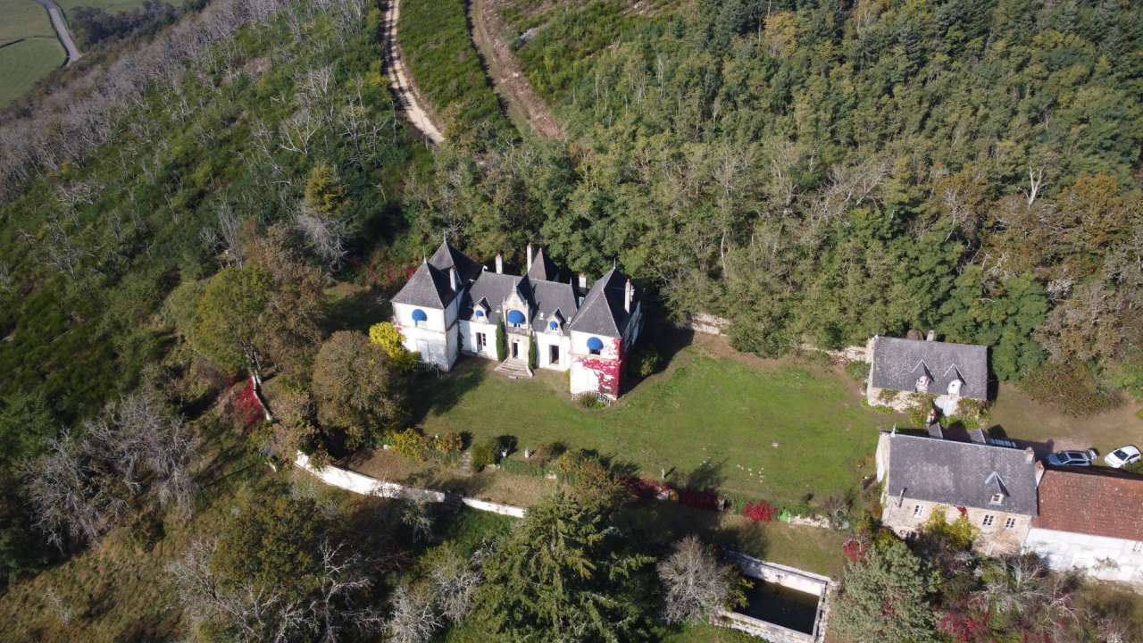 Charming character chateau in a beautiful and private wooded setting with o