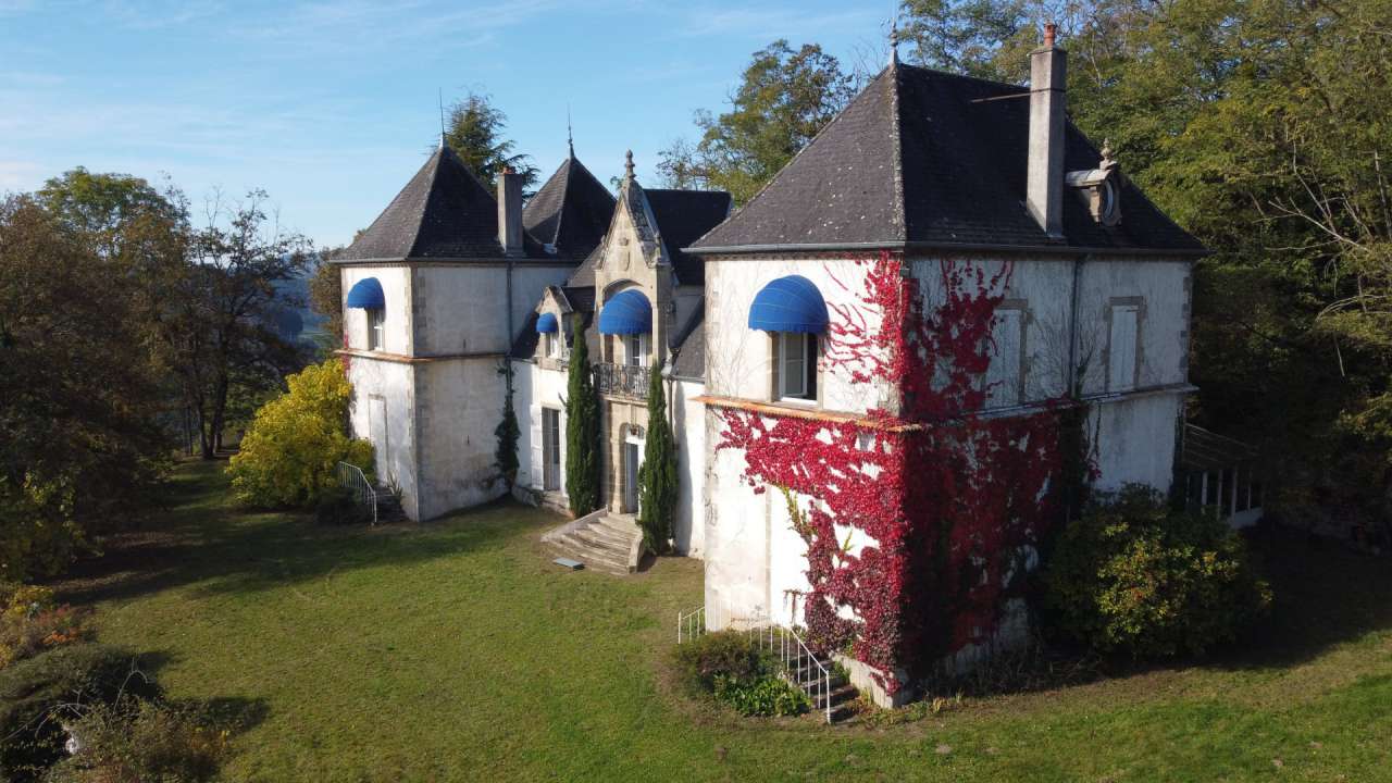 Charming character chateau in a beautiful and private wooded setting with o