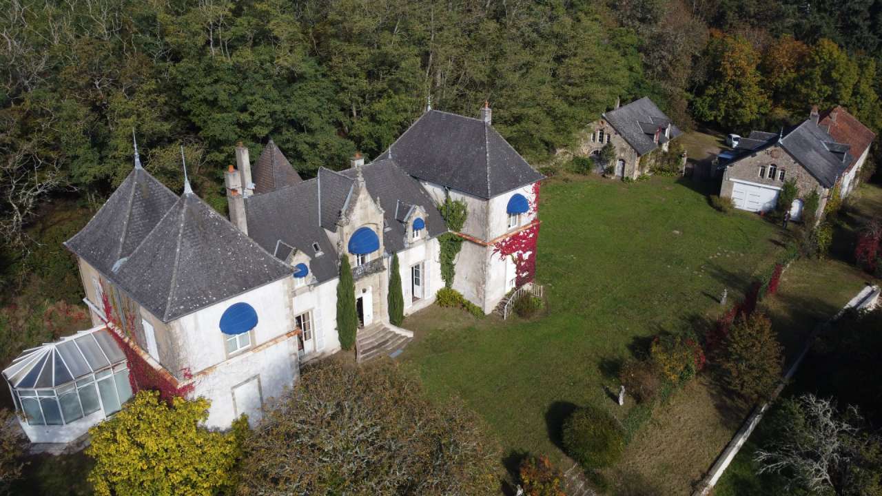Charming character chateau in a beautiful and private wooded setting with o