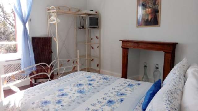 Excellent opportunity to purchase a 7 bedroom home with an attached fully o