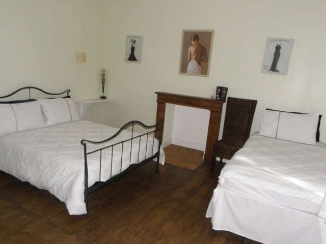 Excellent opportunity to purchase a 7 bedroom home with an attached fully o