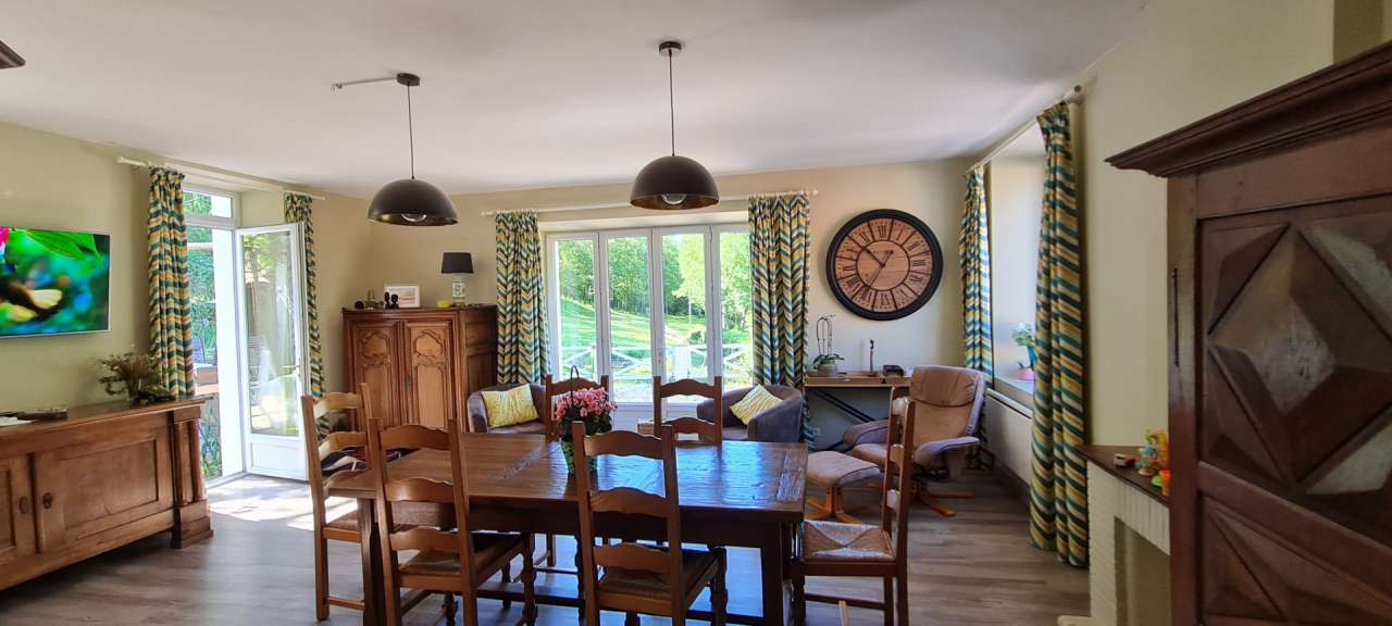 Delightful renovated rural property set in 15 acres with a river, pool, mai