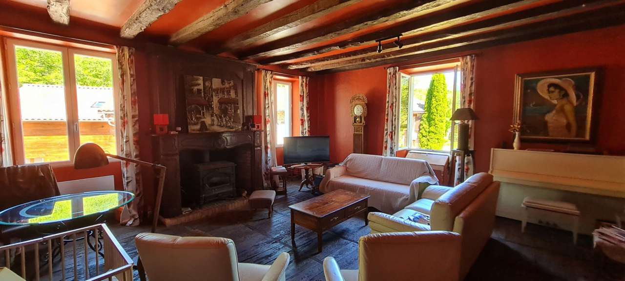 Delightful renovated rural property set in 15 acres with a river, pool, mai