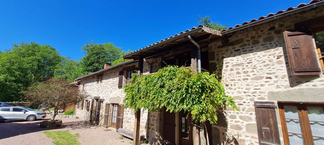 Delightful renovated rural property set in 15 acres with a river, pool, mai