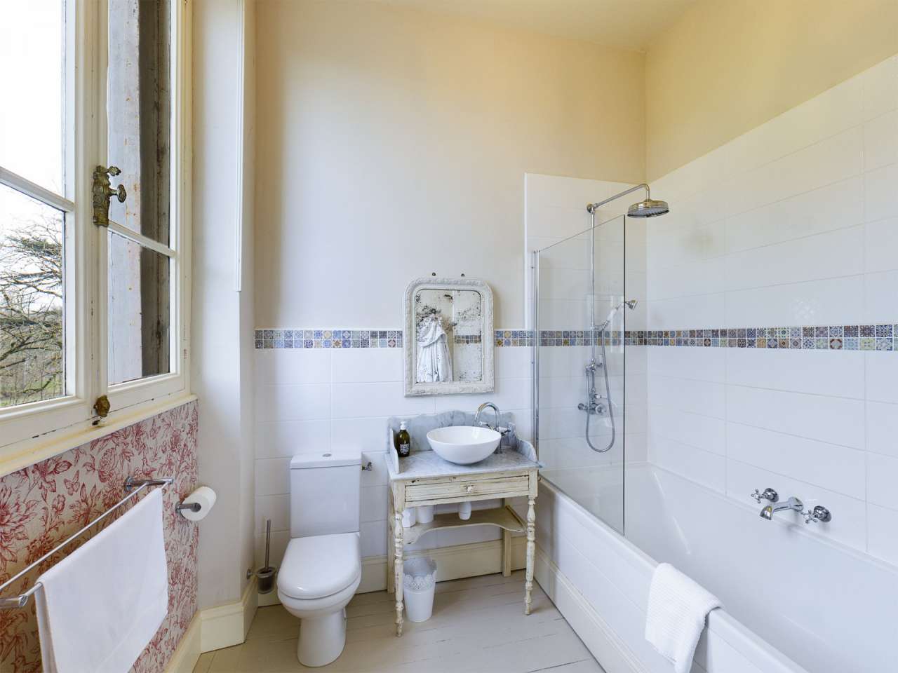 Nestling in over 6 acres of glorious landscaped gardens with pool, woodland