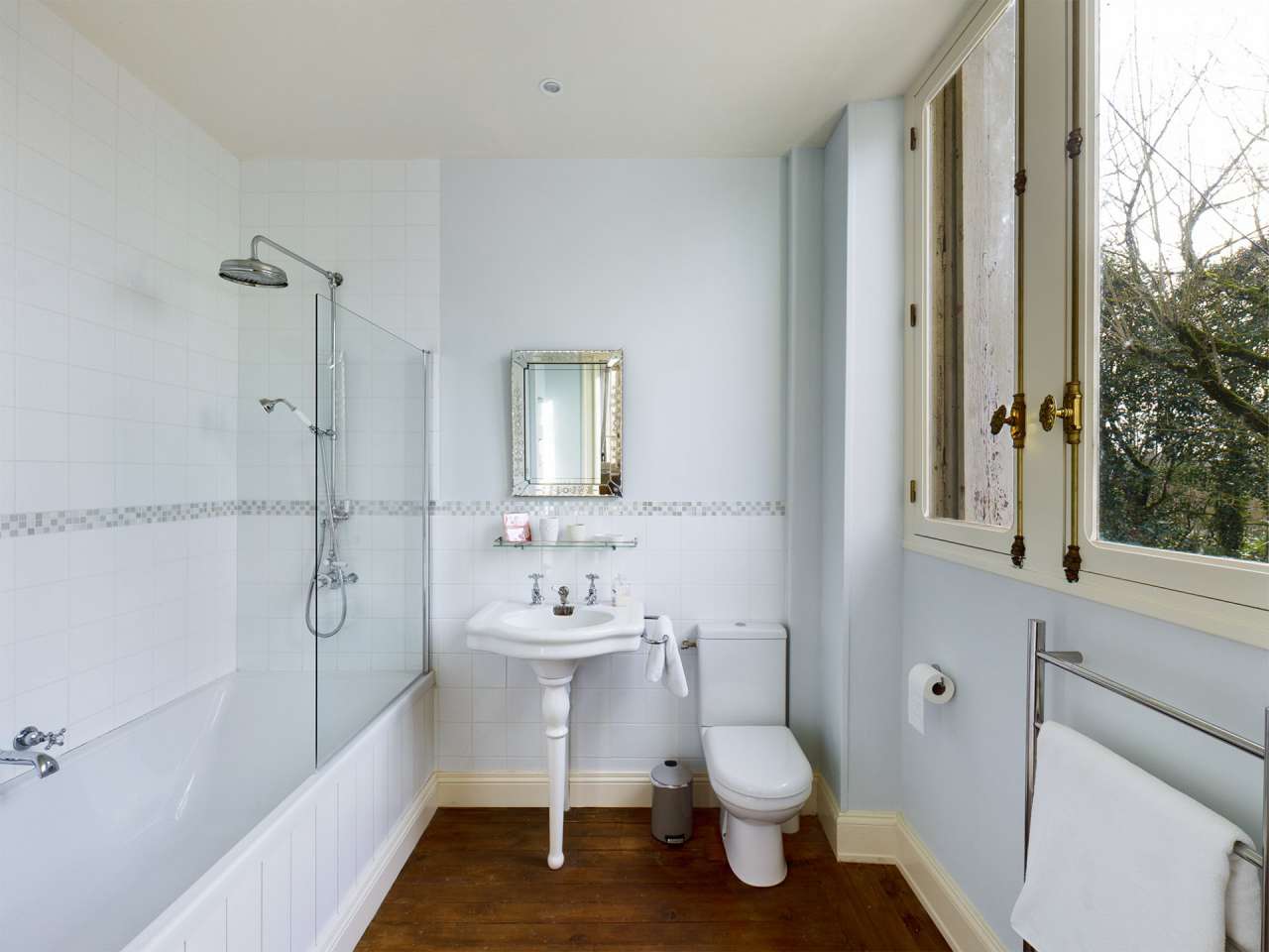 Nestling in over 6 acres of glorious landscaped gardens with pool, woodland