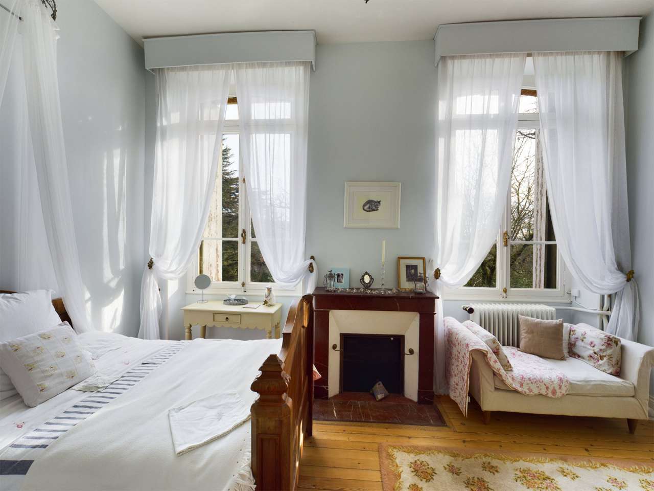 Nestling in over 6 acres of glorious landscaped gardens with pool, woodland