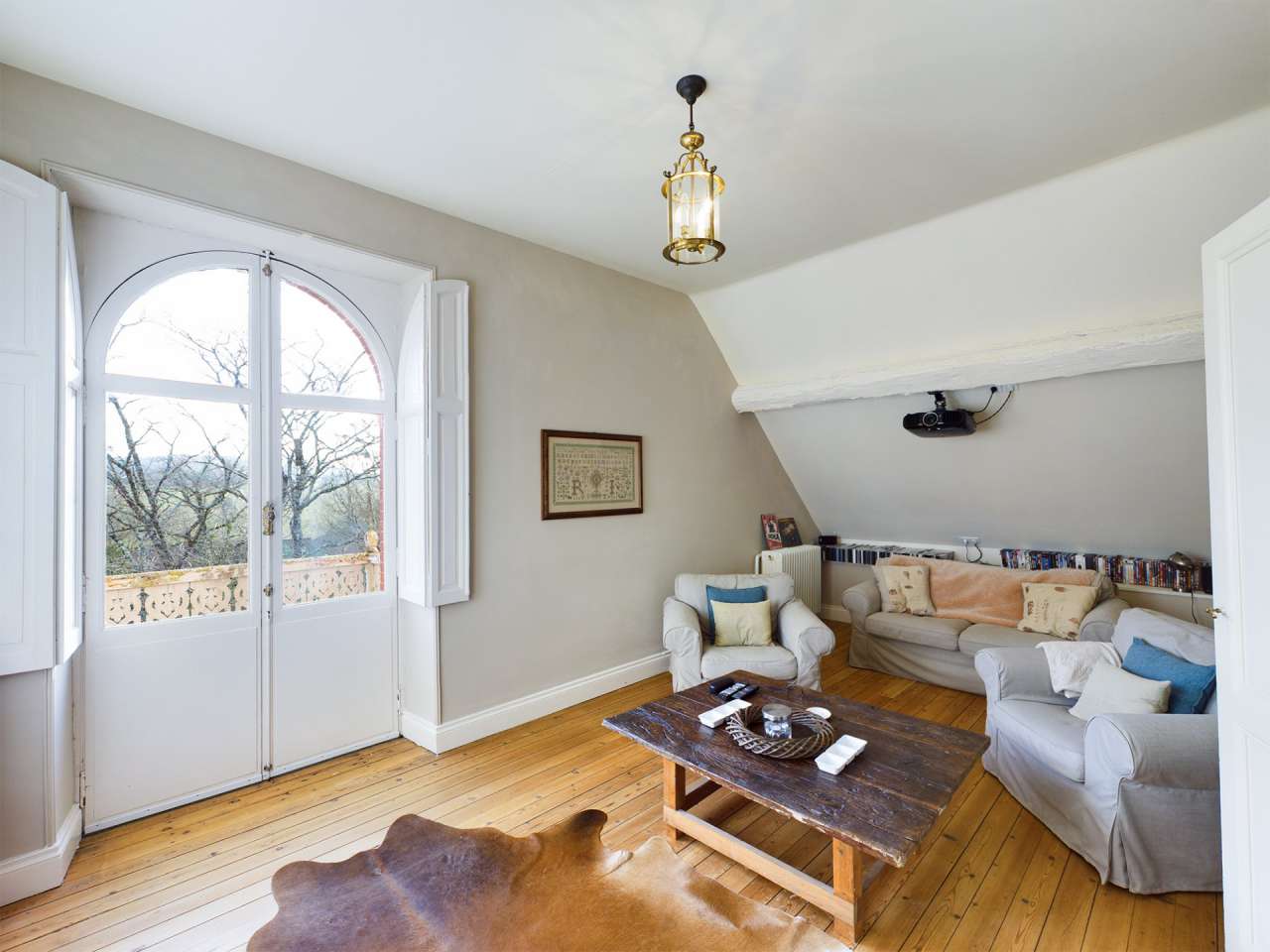 Nestling in over 6 acres of glorious landscaped gardens with pool, woodland