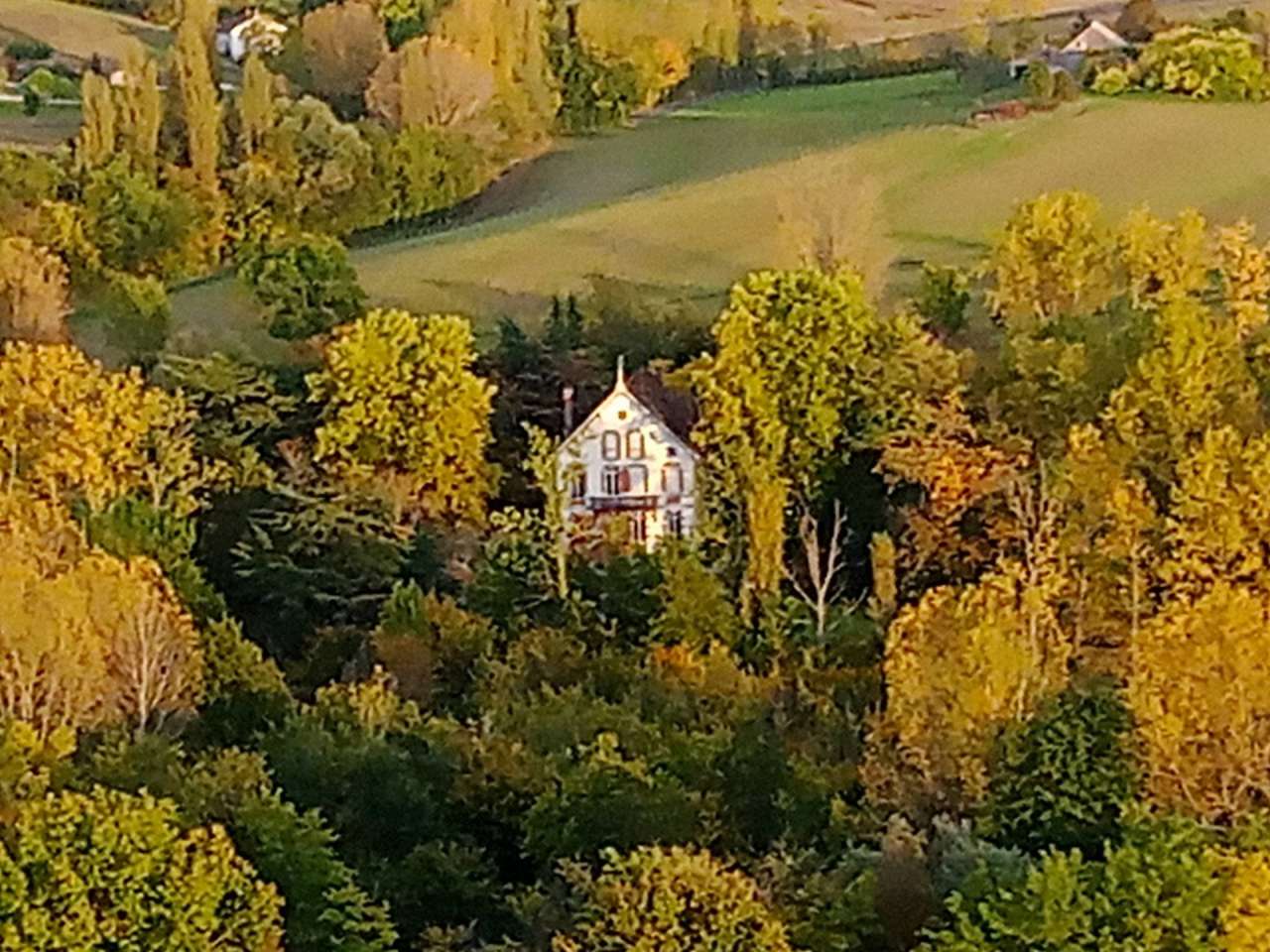 Nestling in over 6 acres of glorious landscaped gardens with pool, woodland