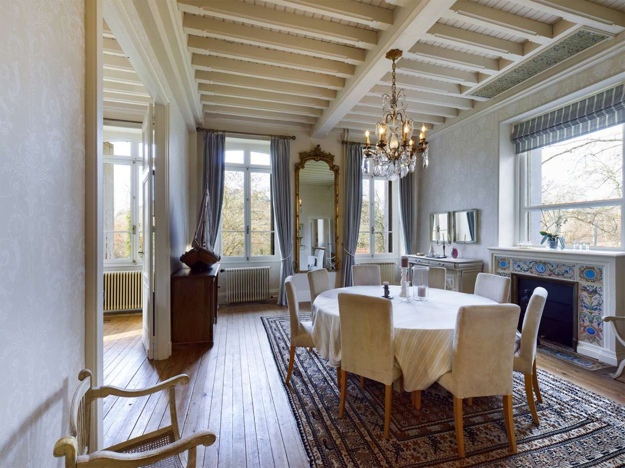 Nestling in over 6 acres of glorious landscaped gardens with pool, woodland